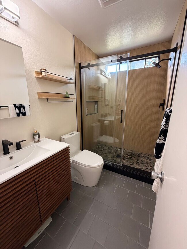 Building Photo - Updated Amalfi model with great patio too