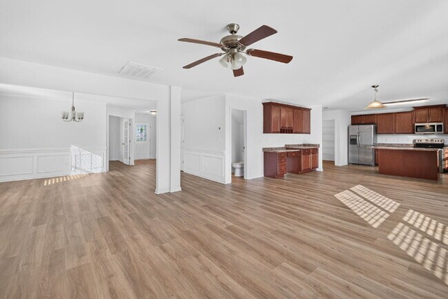 Building Photo - Expansive 4-bedroom, 3.5-bathroom single-family home boasts 3,150 sq. ft.