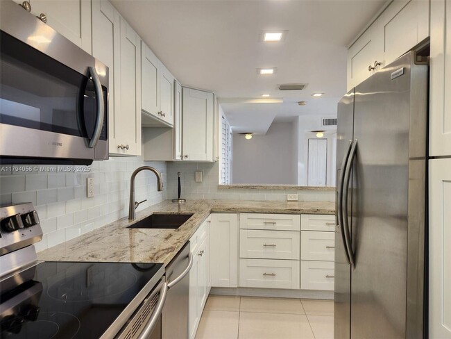 Building Photo - 5201 Orduna Dr