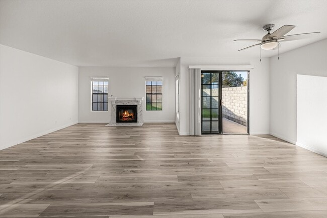 Building Photo - Large Renovated 3bed x 2.5bath Townhouse with Private Patio & 2-Car Garage