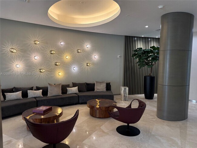 Building Photo - 10275 Collins Ave