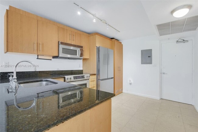 Building Photo - 10275 Collins Ave