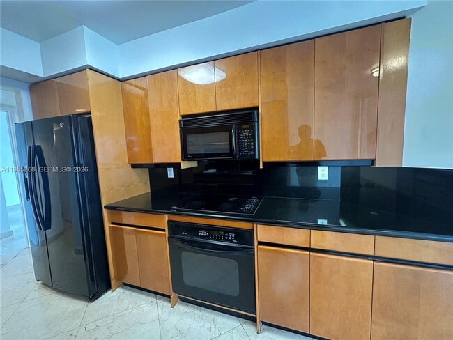 Building Photo - 18671 Collins Ave