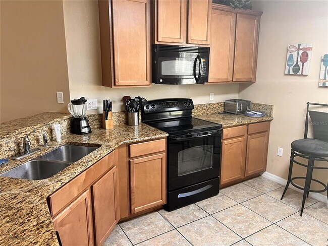 Building Photo - 9017 Paolos Pl