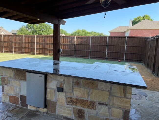 Outdoor Patio with mini fridge - 6902 Wilhelmina Dr