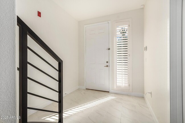 Building Photo - 6745 N 93RD Ave