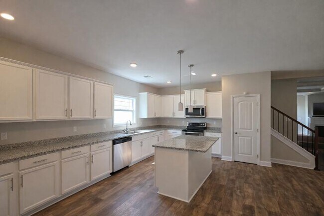 Building Photo - Get ready to fall in love—this sleek, modern beauty in West Creek Farms is bringing the wow facto...