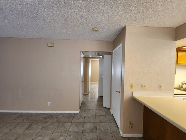 Building Photo - Affordable Condo, Perfect Living Space, Ex...