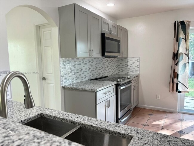 Building Photo - 6452 Royal Palm Beach Blvd