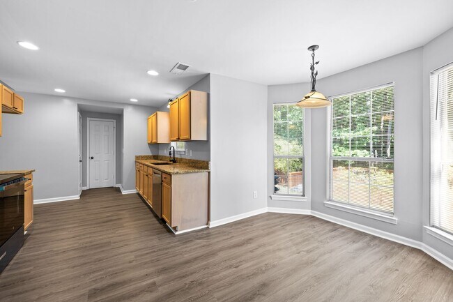 Building Photo - Updated 4BR Home in Northgate District with Huge Back Deck
