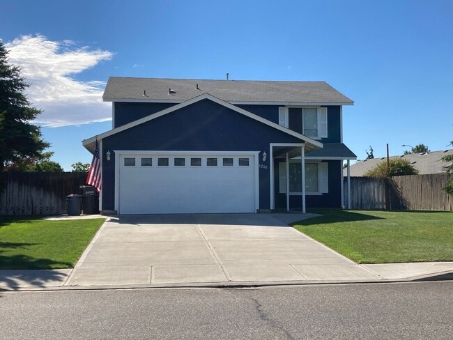 Primary Photo - Modern Two-Story 4-Bedroom Home with Firep...