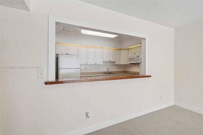 Building Photo - 19390 Collins Ave