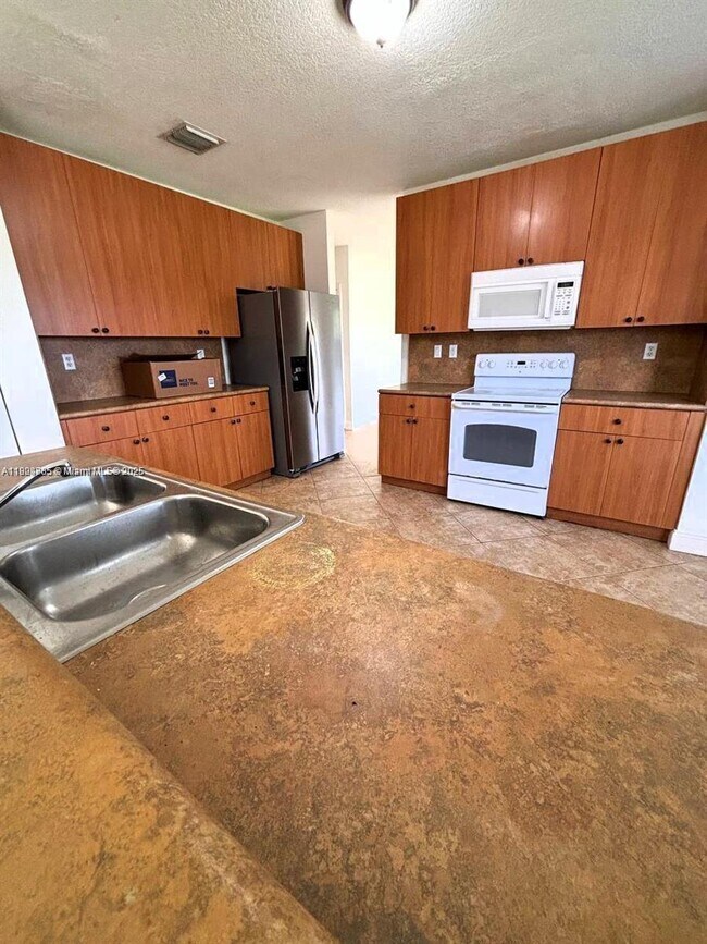 Building Photo - 9032 SW 208th Terrace