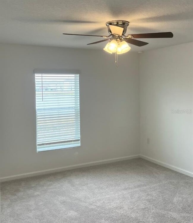 Building Photo - 5130 Magnolia Palm Dr