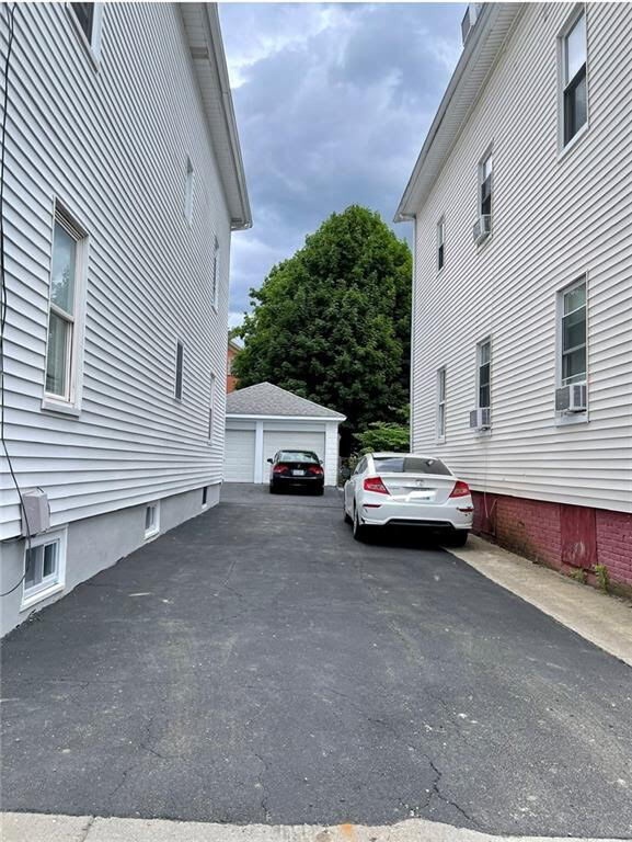 Driveway with plenty of parking and 2 garage spaces - 56 Vinton St