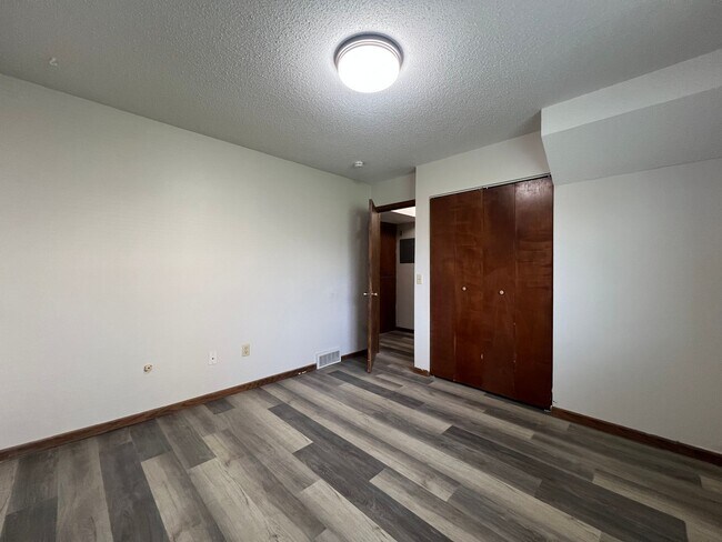 Building Photo - Spacious 2-Bed, 1-Bath Townhome with a Gar...