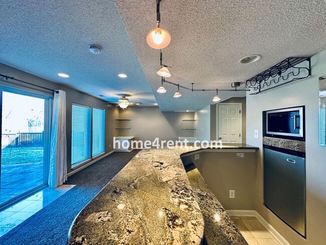 Building Photo - Gorgeous, Updated Home w/ Granite Counters and Wood Floors in Kitchen, Walkout Finished Basement!