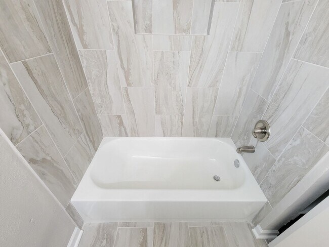 Building Photo - REMODELED/ UPDATED 4 BEDROOM 2 BATH WITH C...