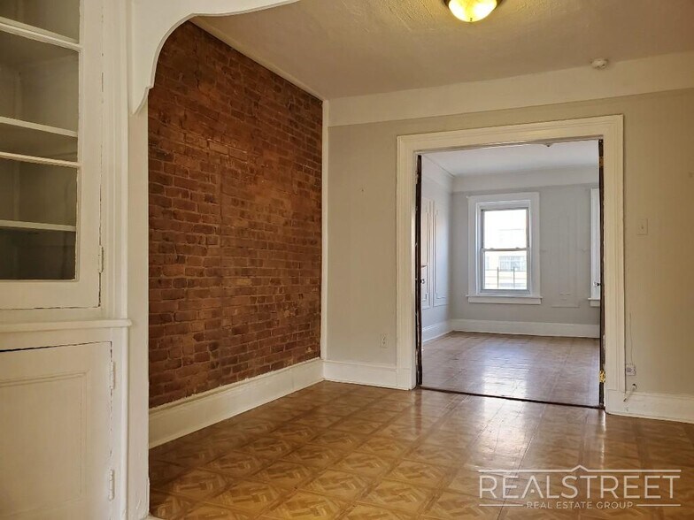 Building Photo - Huge Floor-Through 1 Bedroom with Private Backyard