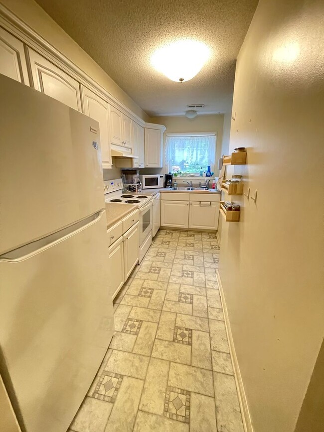 Building Photo - Incredible location! Fidelity Court offers comfort and convenience in the heart of Carrboro...
