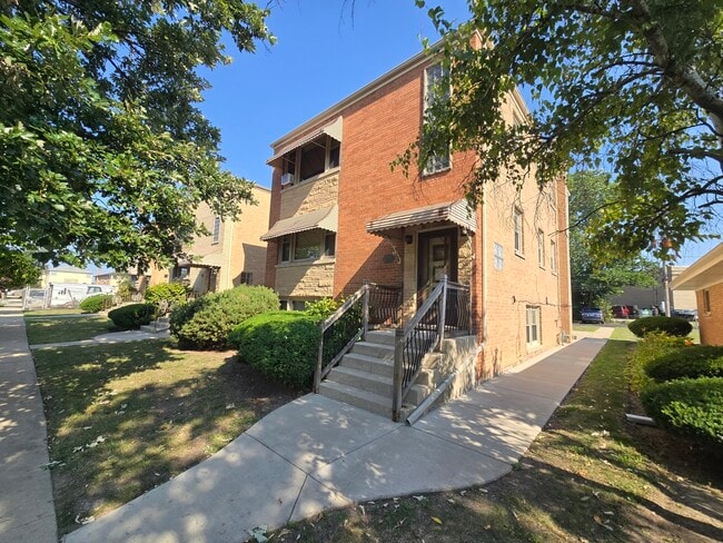 Building Photo - 7124 W Jarvis Ave