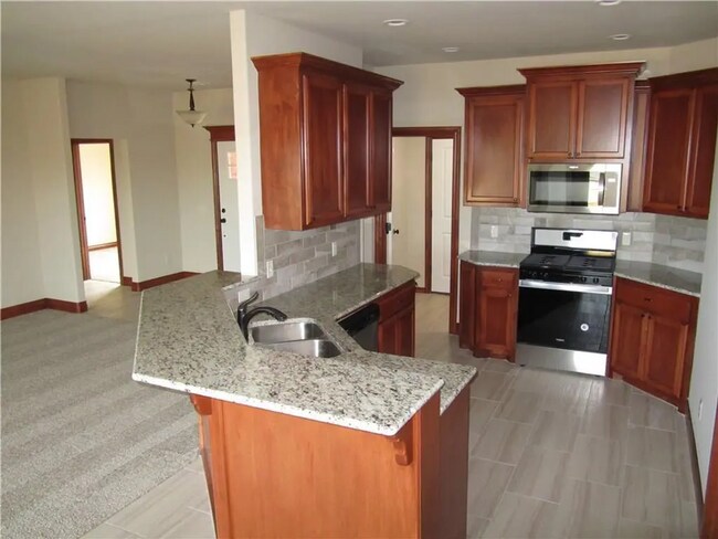 Building Photo - Stylish Modern Home near Veteran's Park: Solar-Powered with 3-Car Garage