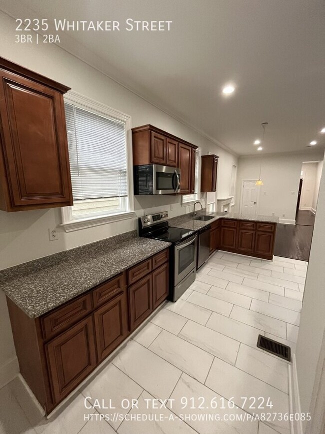 Building Photo - "Spacious 3-Bed, 2-Bath Duplex with Granit...