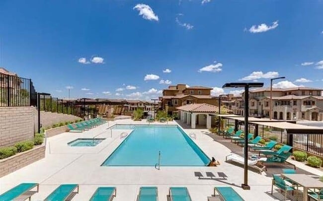 Building Photo - Stunning Summerlin Townhome with Private Downstairs Suite – Gated Community