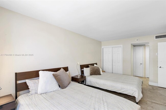 Building Photo - 5555 Collins Ave