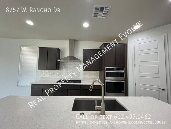 Building Photo - 8757 W Rancho Dr