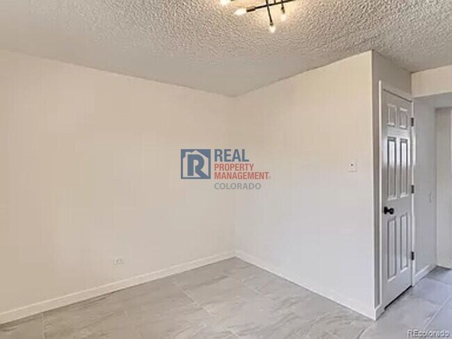 Building Photo - 9110 E Girard Ave