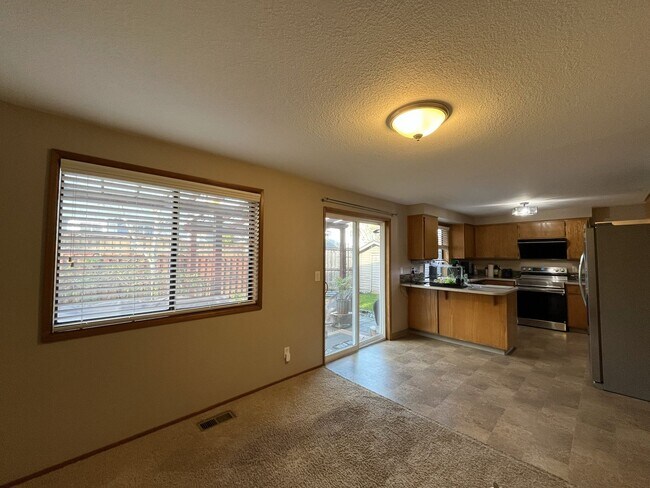 Building Photo - Light-Filled Three Bedroom Home with Private Bonus Space and Outdoor Living