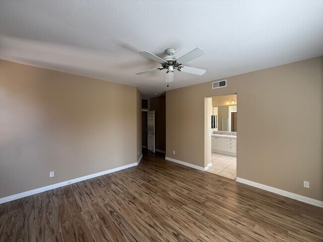 Building Photo - Spacious 3BR/2.5BA Home with Gated Communi...