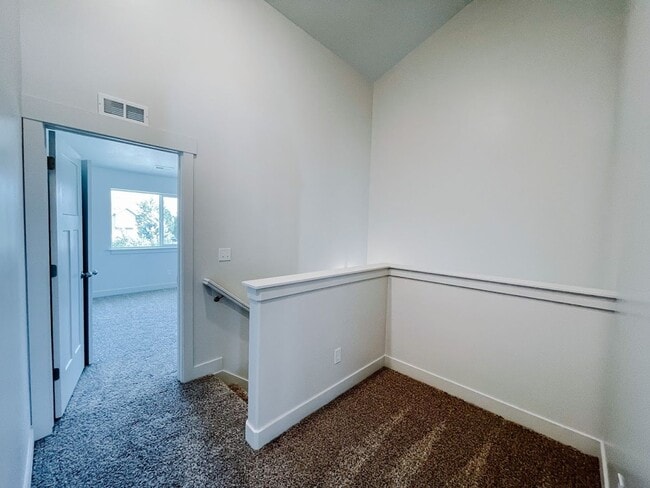 Building Photo - Brand New Idyllic Townhome in AF