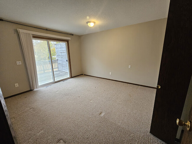 Master Bedroom with Separate Deck (1) - 9702 Pleasant Ave S