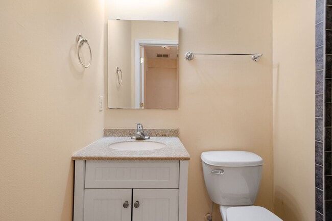 Building Photo - Spacious 2BR/2.5BA Townhome with Finished Basement & Extra Storage