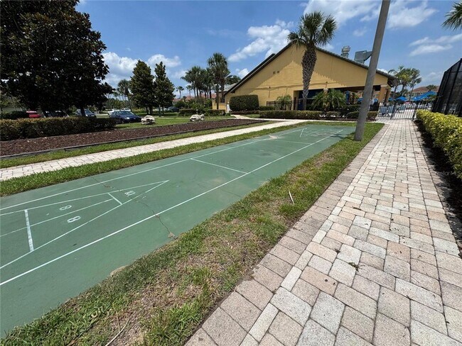 Building Photo - 8977 Coco Palm Rd