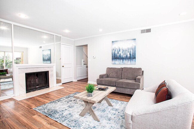 Cozy up by the fireplace in the living room! - 7022 Quail Hill Rd