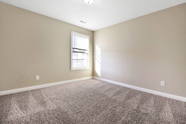 Building Photo - Pet Friendly Three Bedroom with Bonus!