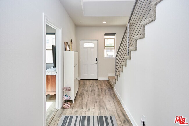 Building Photo - 9831 Alburtis Ave