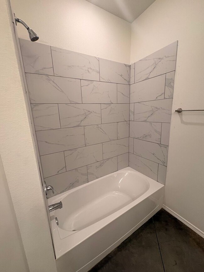 Building Photo - Stunning New 3/2 Townhomes