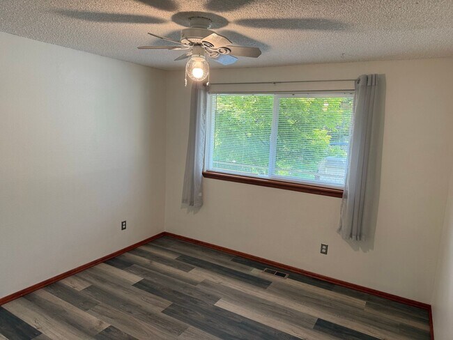 Building Photo - Beautiful 3 Bedroom Ranch Style House with 2 Car Garage, Fences Yard, Fireplace, Shed, Workshop &...