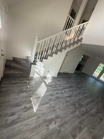 Stair case at front entry - 27 Cherry St