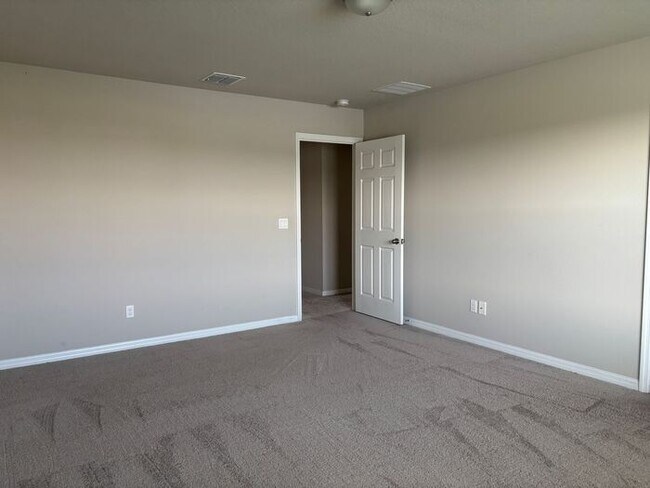 Building Photo - Like-New 4 Bedroom 3 Bath with Pond View & Two Living Spaces — Minutes to South Lake Nona