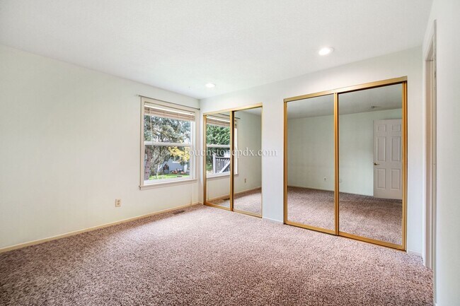 Building Photo - Move in by June 15 and get 2 weeks FREE! Charming Beaverton Home with Fireplace, Deck, and Attach...