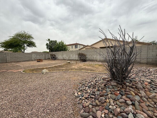 Building Photo - 8278 W Charter Oak Rd