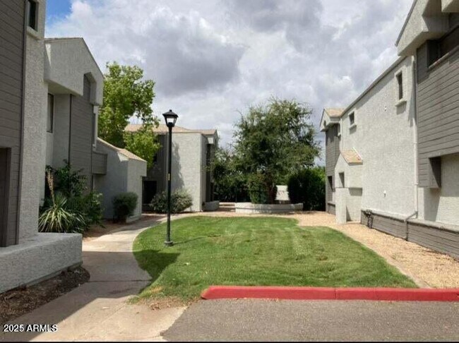 Building Photo - 9407 N 59th Ave