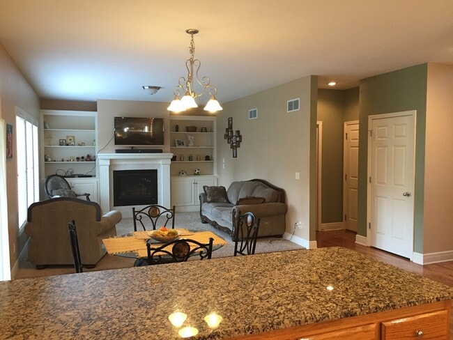 Building Photo - {7301} Quiet Cul-de-sac + Three Car Garage + Updated Kitchen + Finished Basement + Bedroom Level ...