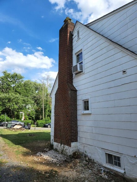 outside left side of house - 1810 N Underwood St