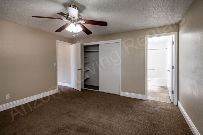 Building Photo - LARGE FENCED YARD WITH DETACHED GARAGE